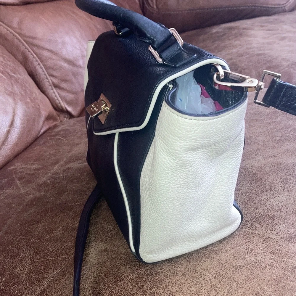 Kate Spade Elegant Black and White pebbled leather Handbag with crossbody strap